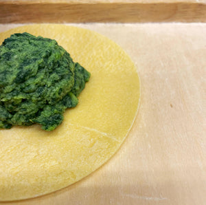 Tortelloni filled with wild herbs and walnut sauce